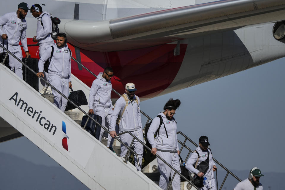 The Philadelphia Eagles arrive ahead of Super Bowl 57 NFL football game, Sunday, Feb. 5, 2023, in Phoenix. The Kansas City Chiefs will play the Philadelphia Eagles on Sunday. (AP Photo/Matt York)