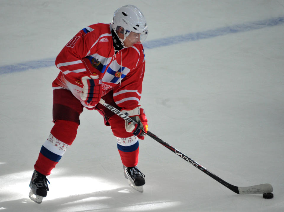 Russian President Vladimir Putin takes part in a friendly ice hockey match with Finnish President Sauli Niinisto, not seen, in Igora resort near in St. Petersburg, Russia, Friday, June 22, 2012. (AP Photo/RIA-Novosti, Alexei Nikolsky, Presidential Press Service)