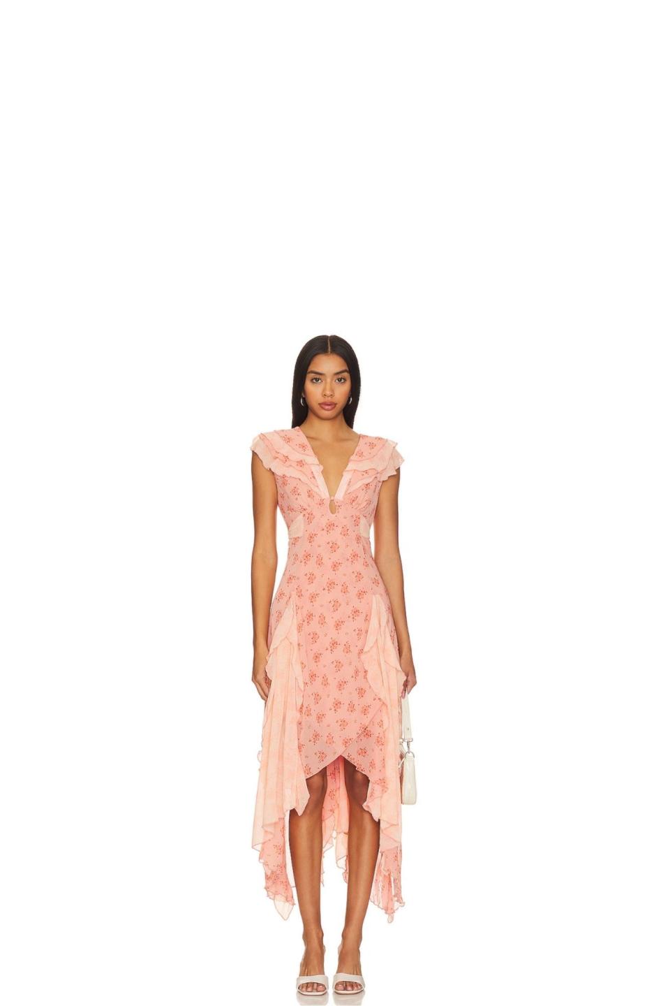 <p><a href="https://go.redirectingat.com?id=74968X1596630&url=https%3A%2F%2Fwww.revolve.com%2Ffree-people-joaquin-dress-in-peach-combo%2Fdp%2FFREE-WD2680%2F%3Fd%3DWomens%26page%3D1%26lc%3D47%26itrownum%3D36%26itcurrpage%3D1%26itview%3D05&sref=https%3A%2F%2Fwww.cosmopolitan.com%2Fstyle-beauty%2Ffashion%2Fg60429487%2Fbeach-wedding-guest-dresses%2F" rel="nofollow noopener" target="_blank" data-ylk="slk:Shop Now;elm:context_link;itc:0;sec:content-canvas" class="link ">Shop Now</a></p><p>Joaquin Dress</p><p>Revolve</p><p>$198.00</p>