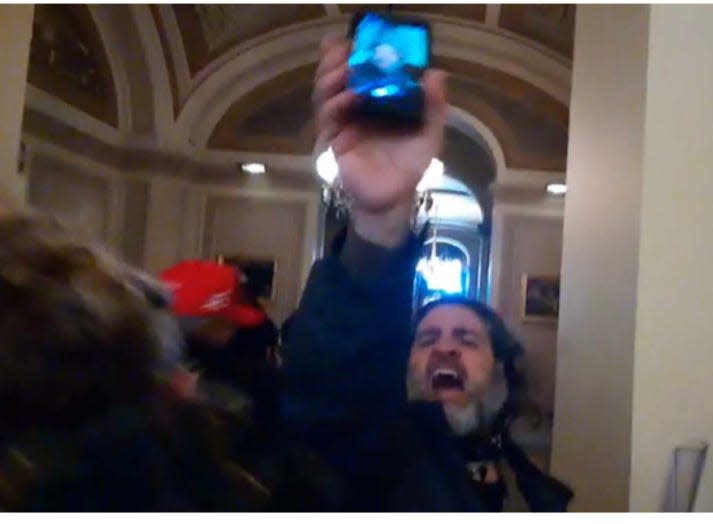 Dominic Pezzola inside the U.S. Capitol on Jan. 6, according to court filings.