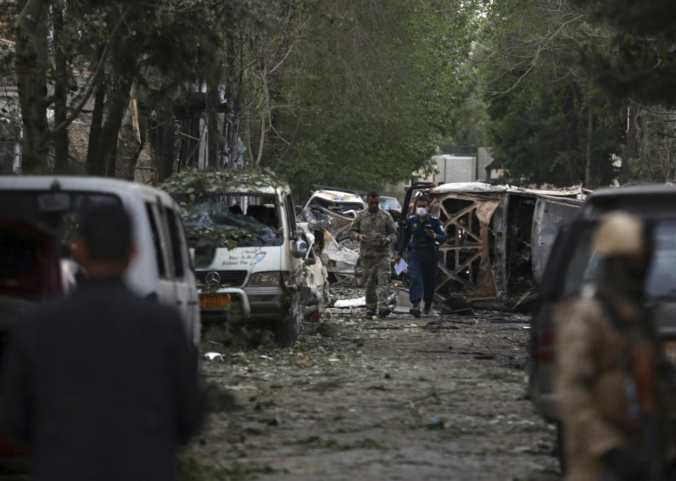 Afghan security forces guard the site of an explosion in Kabul, Afghanistan, Wednesday, May 8, 2019. The Taliban attacked the offices of an international NGO in the Afghan capital, setting off a huge explosion and battling Afghan security forces in an assault that killed at least five people, interior ministry said in a statement. (AP Photo/Rahmat Gul)