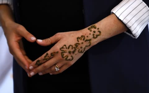 The henna tattoo, intended to celebrate Meghan's pregnancy - Credit: Getty