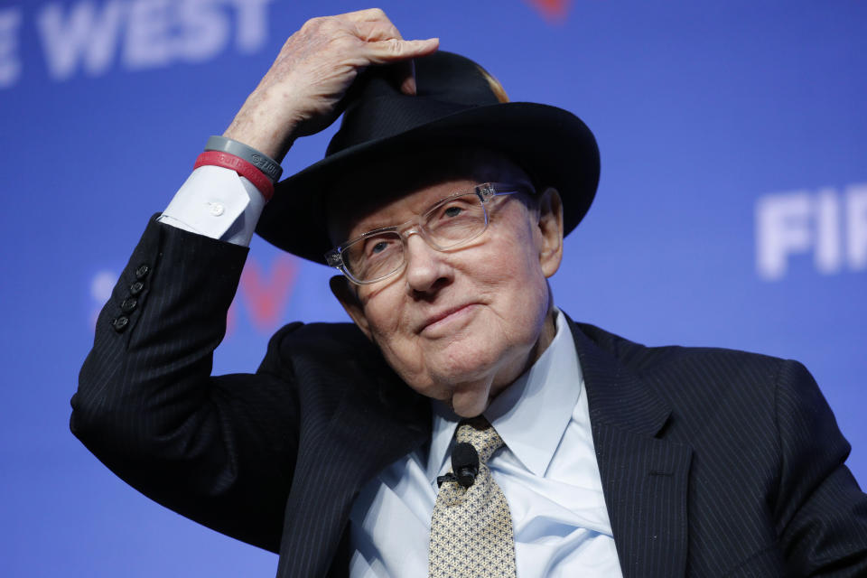 FILE - Former U.S. Sen. Harry Reid tips his hat during a fundraiser for the Nevada Democratic Party, on Nov. 17, 2019, in Las Vegas. Reid, the former Senate majority leader and Nevada’s longest-serving member of Congress, has died. He was 82. (AP Photo/John Locher, File)