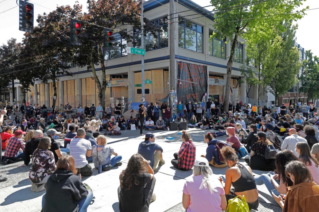 Protester have occupied the area around a Seattle police station deeming it Capitol Hill Autonomous Zone: AP