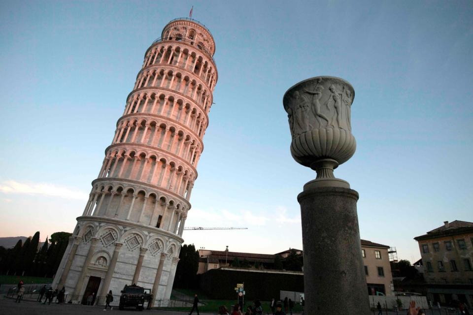 The Garisenda Tower tilts at one degree less than the five degree slant of the leaning tower of Pisa, pictured (AFP/Getty Images)