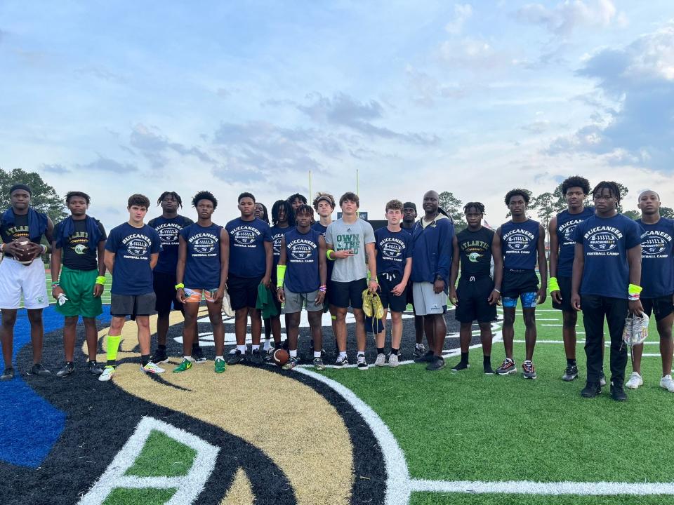 A group of Atlantic football players took flight on a tour through four states, visiting schools big and small in hopes of putting their names on the radar of college recruiters.