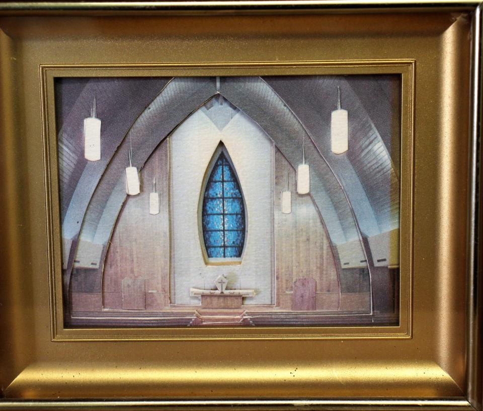 An image of the interior of Brook Hollow Christian Church at South Willis Street is displayed at the new BHCC.