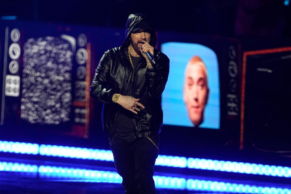 Eminem, pictured here performing during the Rock & Roll Hall of Fame Induction Ceremony in 2022, goes after Benzino's physical appearance and finances in "Doomsday Pt. 2."