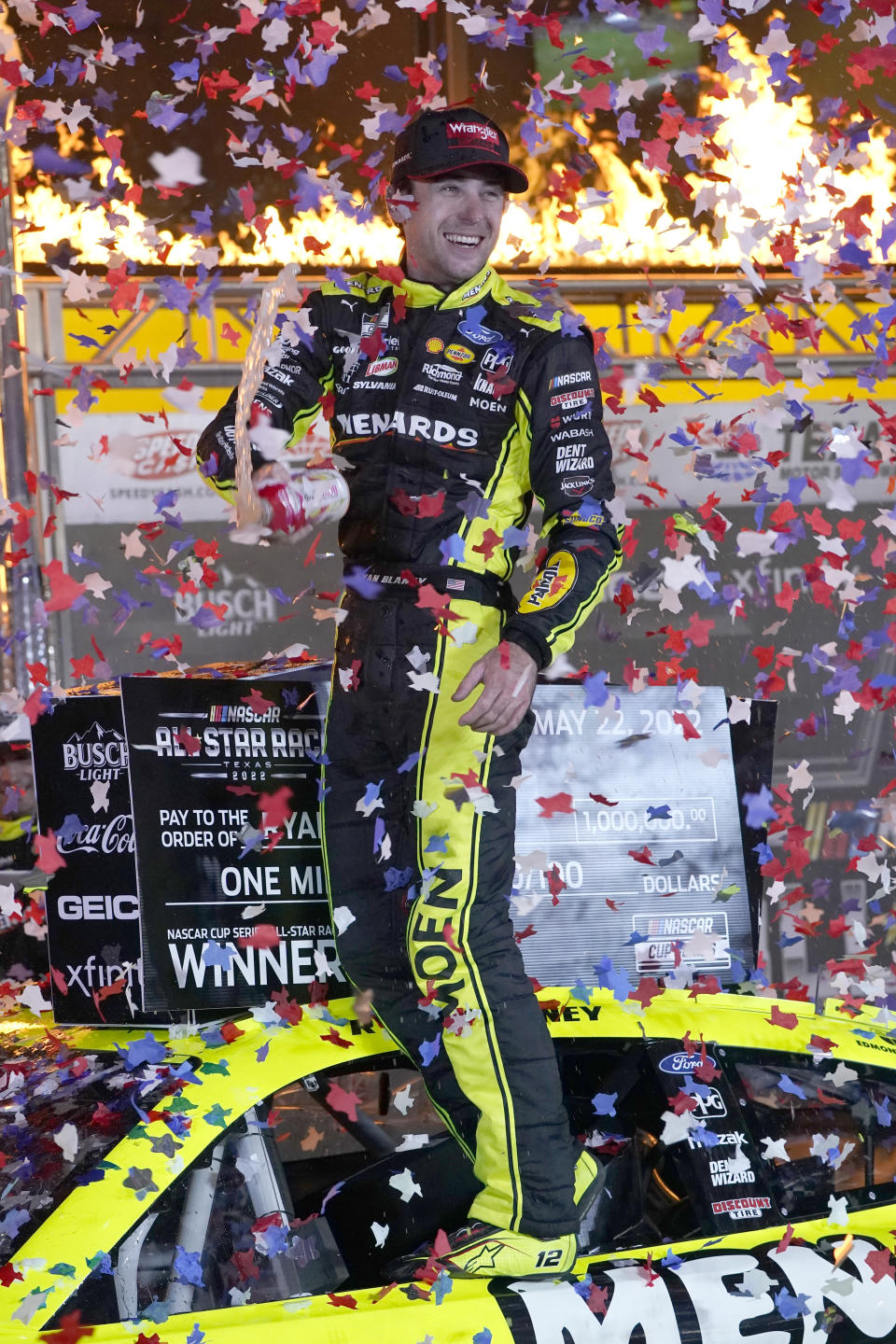 Ryan Blaney (12) celebrates in Victory Lane after winning the NASCAR All-Star auto race at Texas Motor Speedway in Fort Worth, Texas, Sunday, May 22, 2022. (AP Photo/Larry Papke)