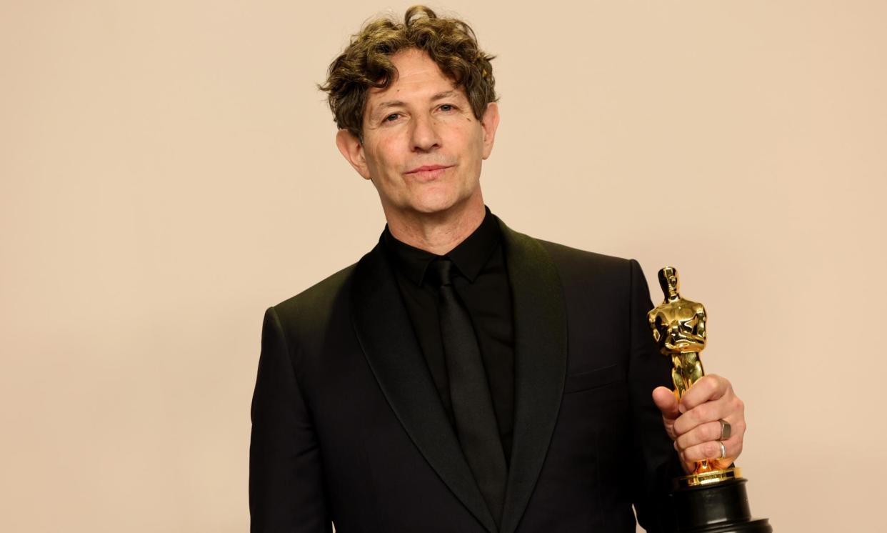 <span>Jonathan Glazer, winner of the Best International Feature Film award for The Zone of Interest in Hollywood, California, on 10 March 2024.</span><span>Photograph: Arturo Holmes/Getty Images</span>