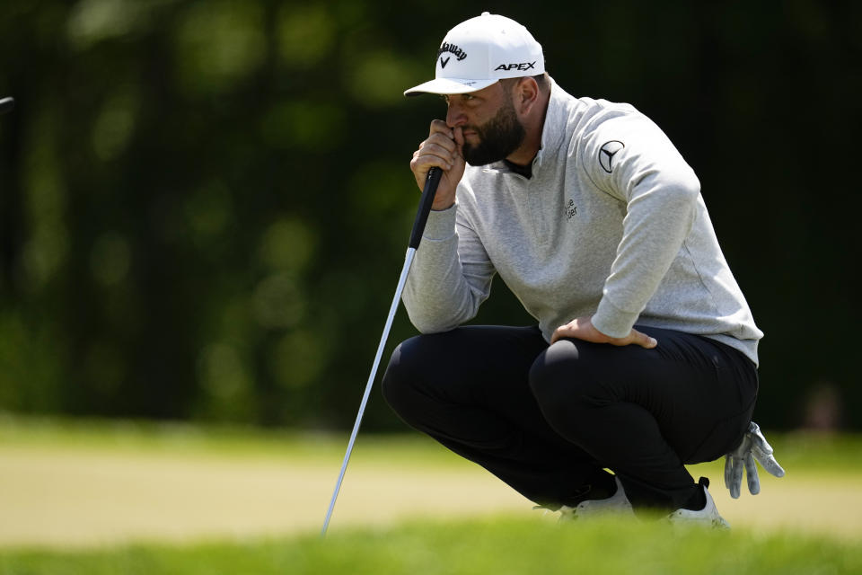 Jon Rahm, of Spain, lines up a putt on the second hole during the first round of the PGA Championship golf tournament at Oak Hill Country Club on Thursday, May 18, 2023, in Pittsford, N.Y. (AP Photo/Abbie Parr)