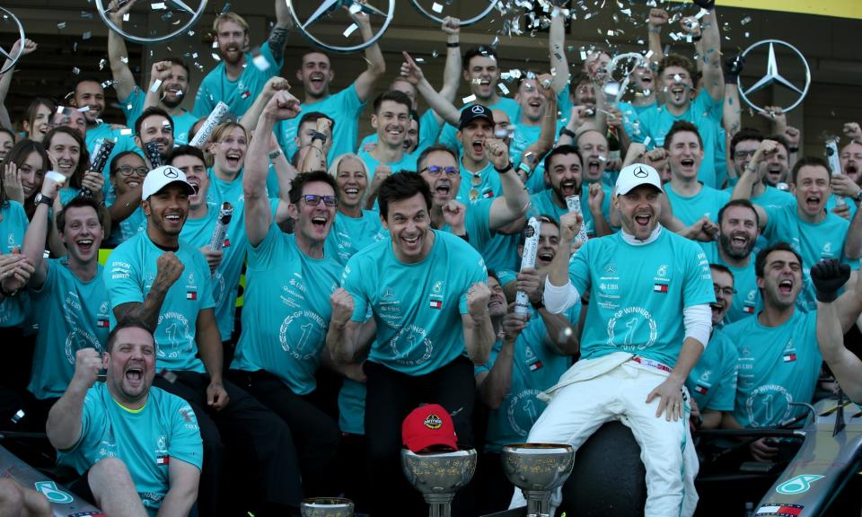 <span>‘I register no difference between any single employee and the drivers’: Toto Wolff with the Mercedes team after winning the constructors championship in 2019</span><span>Photograph: Charles Coates/Getty Images</span>