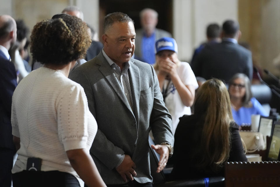 Los Angeles Dodgers manager Dave Roberts arrives for a ceremony honoring baseball star Shohei Ohtani, Friday, May 17, 2024, during a council meeting in Los Angeles. (AP Photo/Damian Dovarganes)