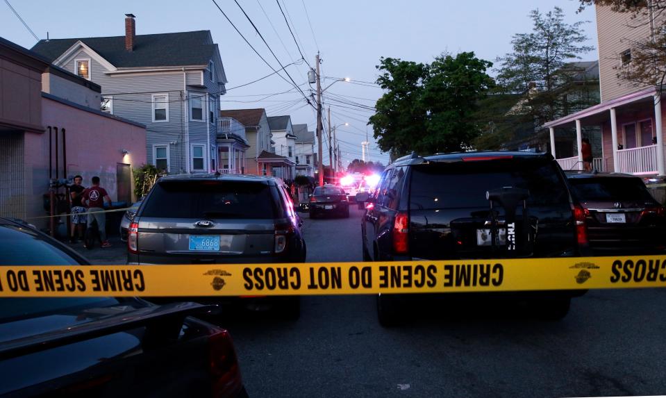 Providence, RI, May 13, 2021 - Providence police investigate the scene were nine people were shot near 87 Carolina St. in Providence around 6:47pm on Thursday evening.  [The Providence Journal / Kris Craig]  