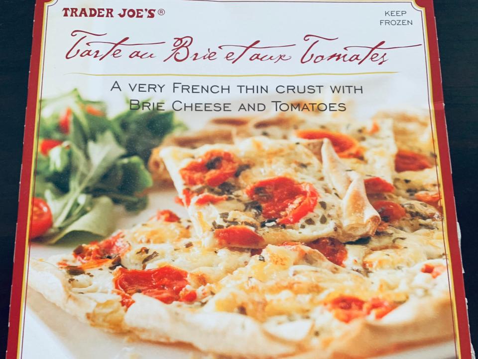 red and white box of Trader Joe's brie and tomato tarte