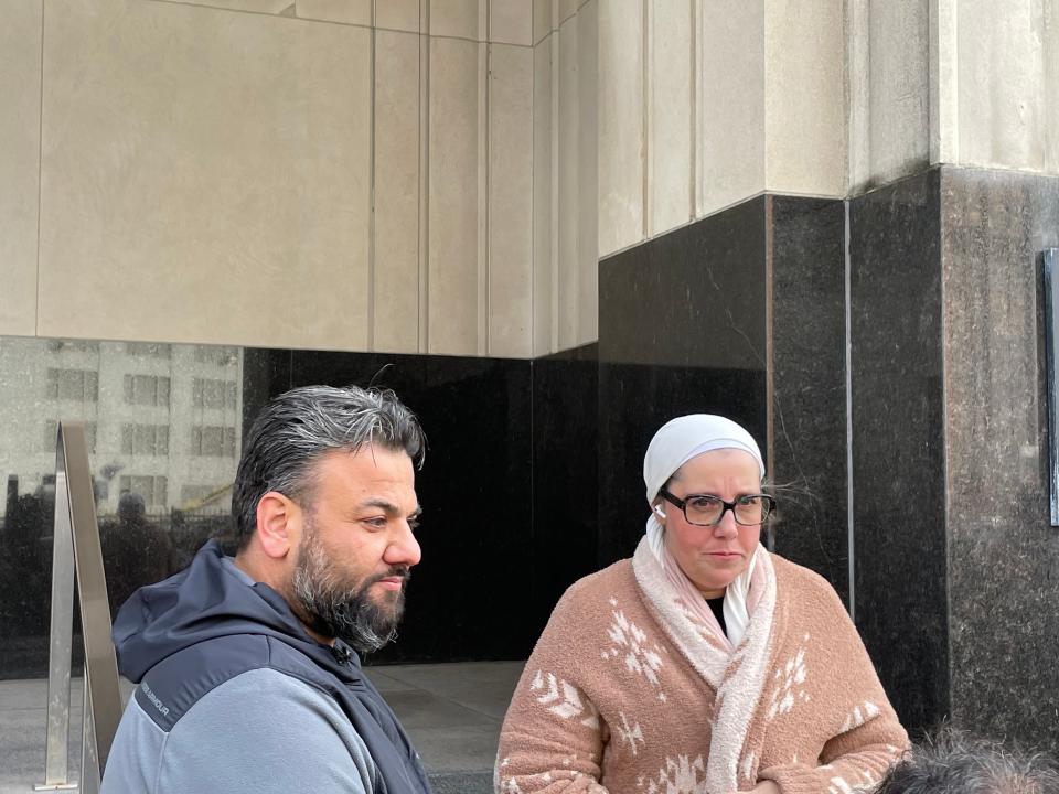 Yahya Alarayshi and his wife, Lisa Alarayshi, on Nov. 2, 2023, outside federal courthouse building on Lafayette in downtown Detroit asking the U.S. government to help rescue their parents trapped in Gaza.