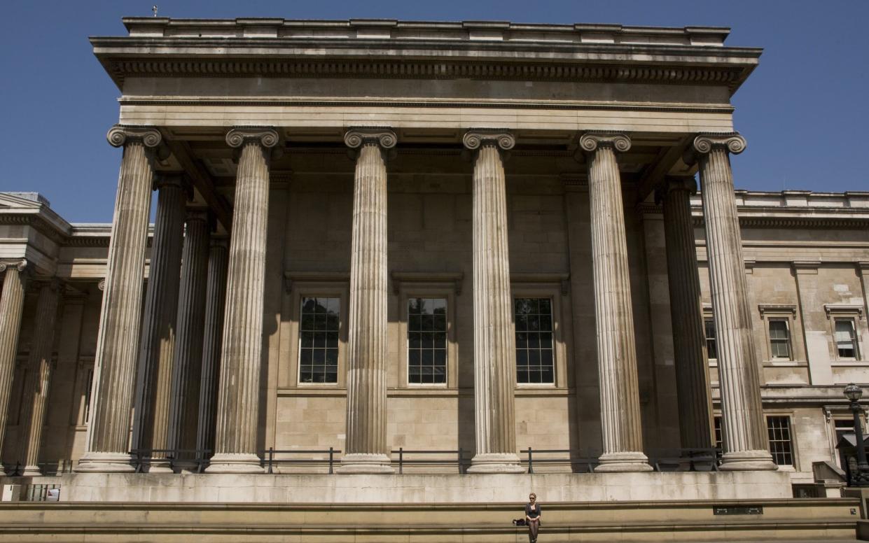 A lone visitor the British Museum is seen outside the entrance - George Rose/Getty Images