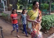 Viju Chavan, shown here with her daughters, gave birth in hospital as two armed gunmen prowled the corridors