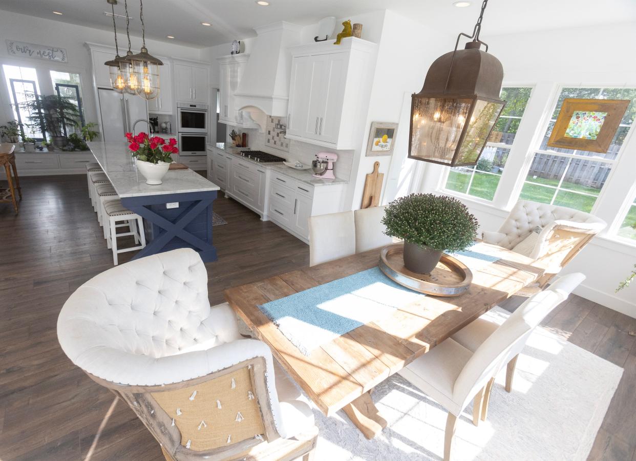 Natural light spills into the dining area in the modern farmhouse shared by Michael Kell and Sally Goodnow in Plain Township. The home built in 2019 features an open first-floor layout.