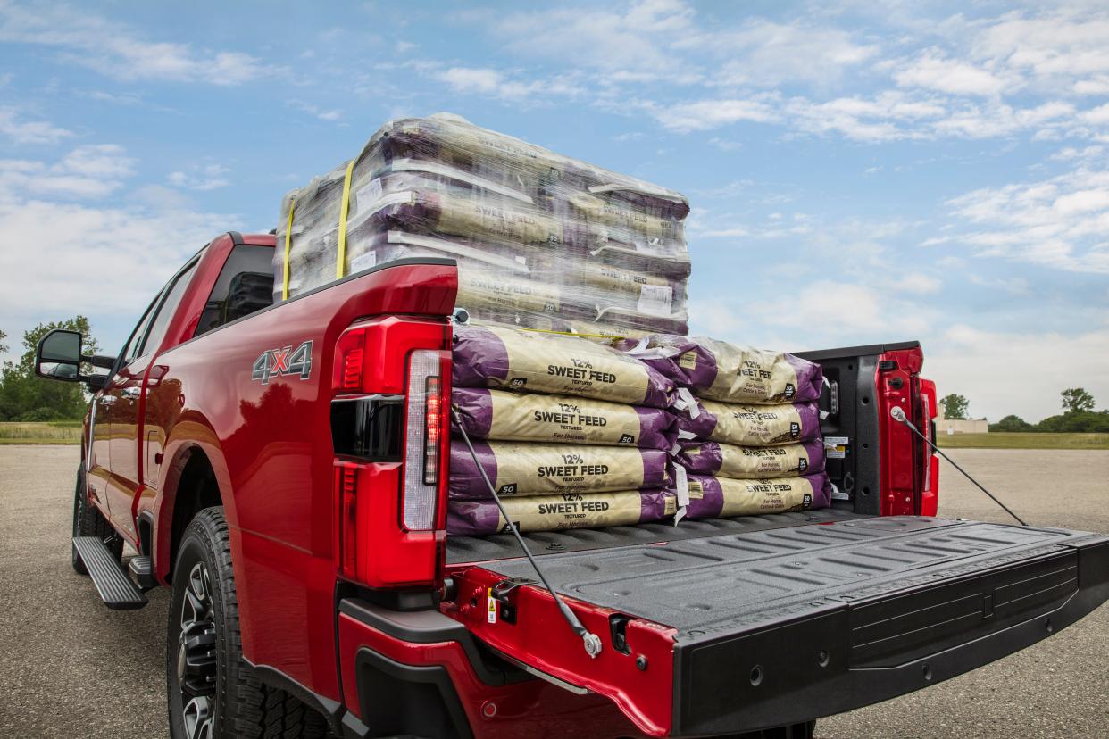 A camera mounted in the top of the tailgate of Ford 2023 Super Duty pickups makes it easier to back up with a loaded bed.