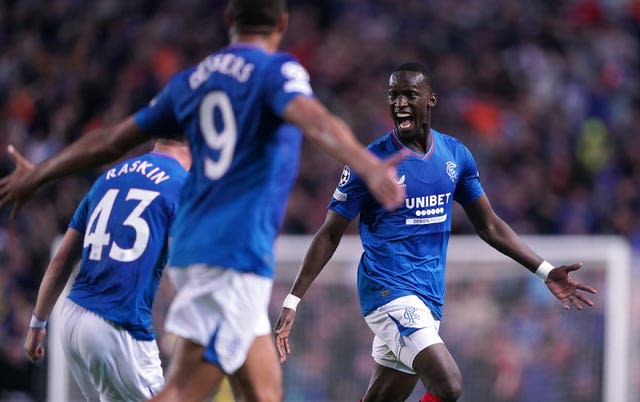 Abdallah Sima, right, celebrates his opening goal