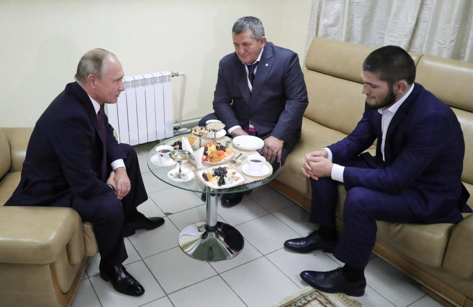 Vladimir Putin, Abdulmanap Nurmagomedov, and Khabib Nurmagomedov