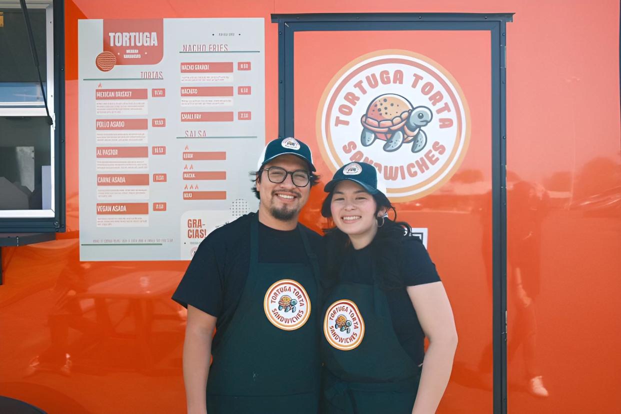 Luis and Manon Pantaleon stand in front of their food truck Tortuga Torta during their soft opening April 14. Their truck is at 3867 S. Campbell Ave.