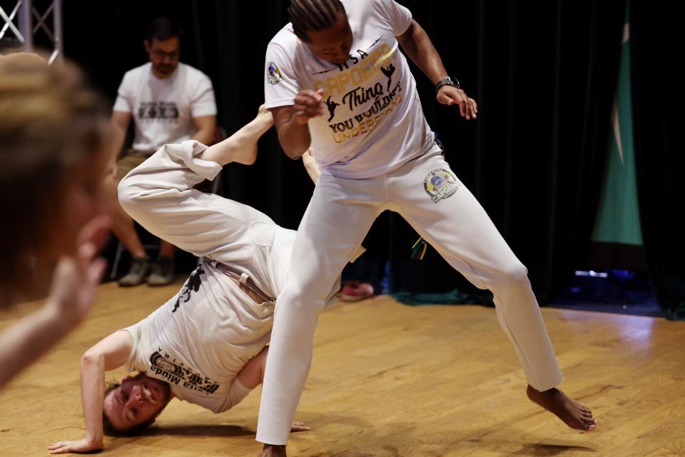Feyd Taylor and BJ Stringfield take part in a capoeira class at Trolley Square in Salt Lake City on Friday, April 28, 2023. | Scott G Winterton, Deseret News