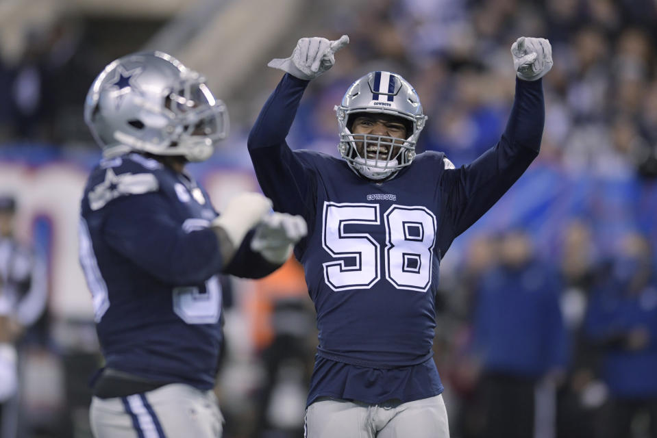 Dallas Cowboys defensive end Robert Quinn triggered a big roster bonus Sunday night. (AP Photo/Bill Kostroun)