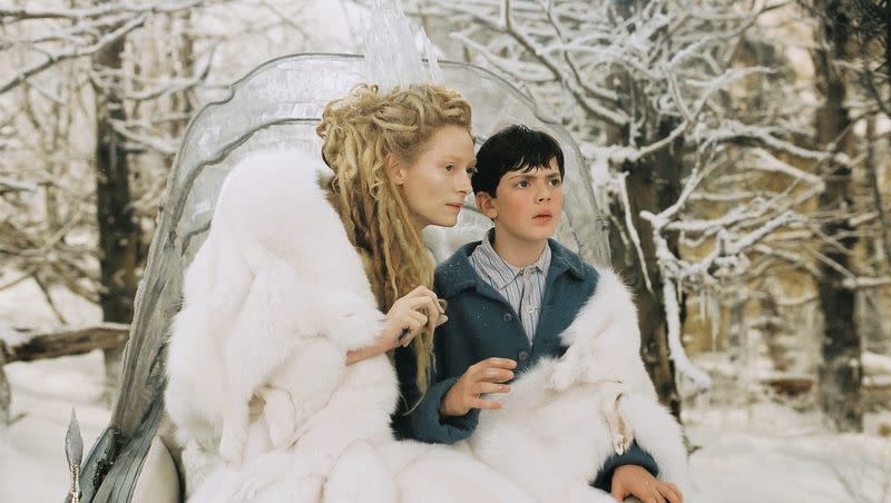 The White Witch (Tilda Swinton) uses enchanted Turkish Delight to convince Edmund (Skander Keynes) in “The Chronicles of Narnia: The Lion, The Witch and The Wardrobe.” 