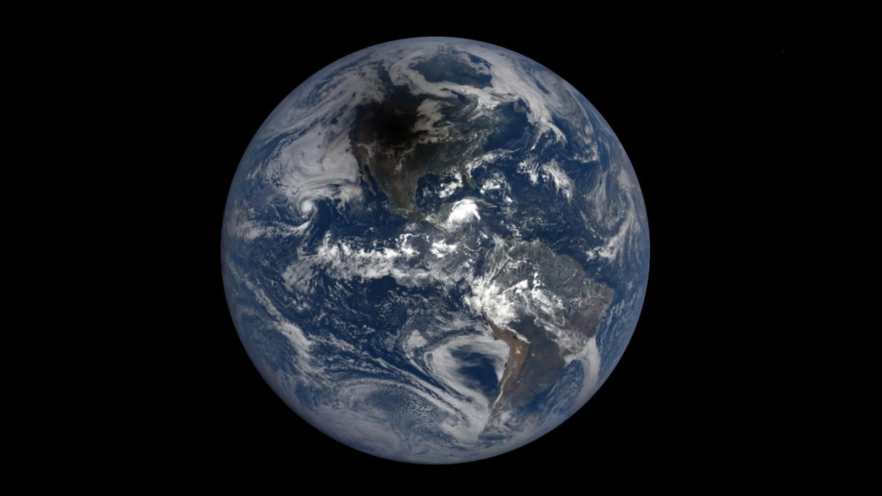  Screenshot of National Oceanic and Atmospheric Administration satellites GOES-East and GOES-West watched as the shadow of the moon darkened the surface of Earth. 