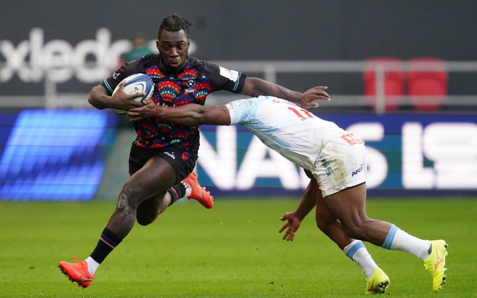 Bristol Bears' Gabriel Ibitoye (left) is tackled by Vodacom Bulls' Sergeal Petersen during the Investec Champions Cup match at Ashton Gate, Bristol