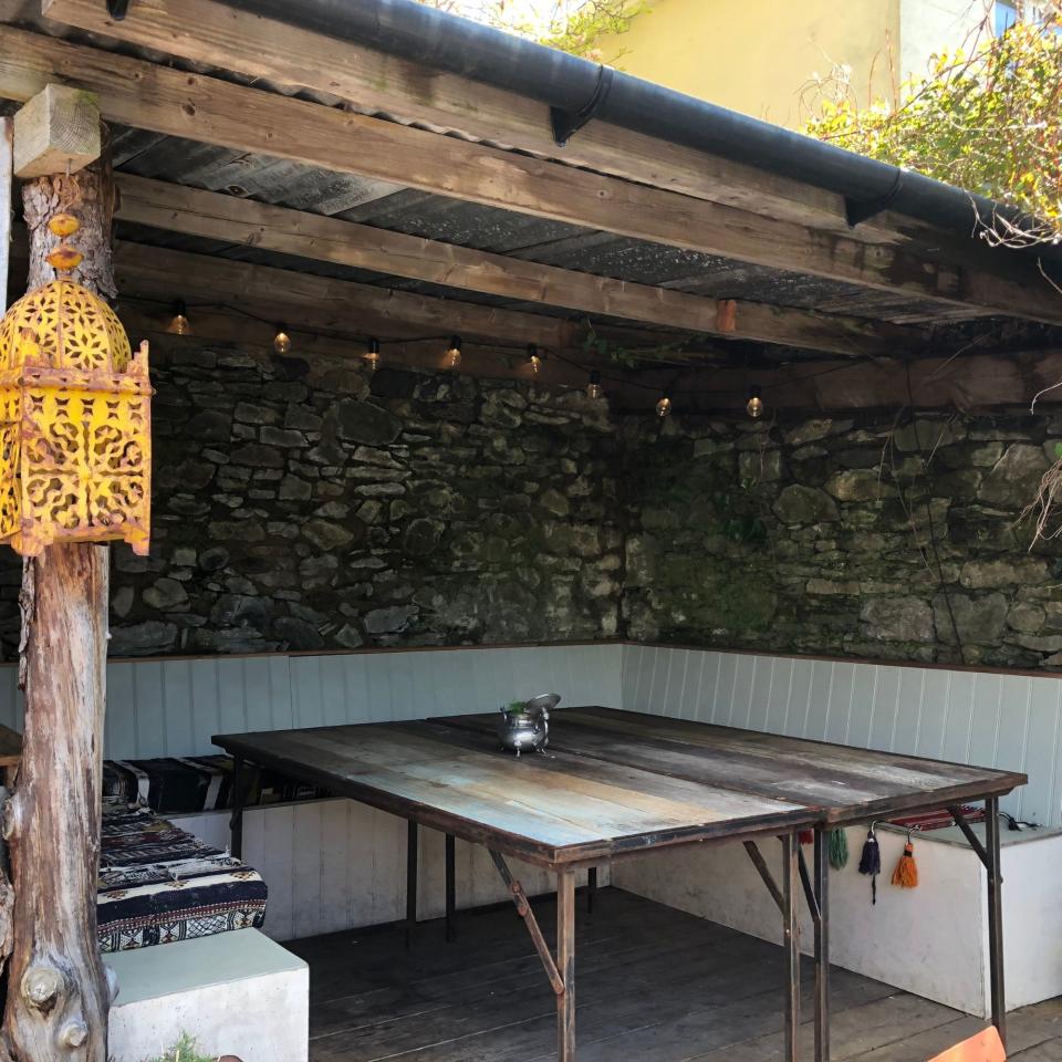 Cosy seating in an outdoor room in Ashburton