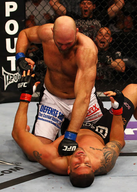 ATLANTA, GA - APRIL 21: Ben Rothwell (top) punches Brendan Schaub during their heavyweight bout for UFC 145 at Philips Arena on April 21, 2012 in Atlanta, Georgia.