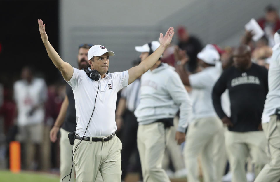 South Carolina coach Shane Beamer gestures for fans to make more noise on a Florida fourth down during the second half of an NCAA college football game Saturday, Oct. 14, 2023, in Columbia, S.C. (AP Photo/Artie Walker Jr.)