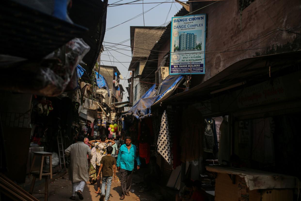 An advertisement for residential property in the Dharavi market in Mumbai, India, on Thursday, Jan. 5, 2023. 