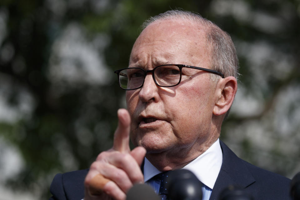 FILE - In this May 3, 2019, file photo, White House chief economic adviser Larry Kudlow speaks with reporters outside the White House in Washington. The White House's top economic adviser, Kudlow, acknowledged Sunday, May 12, that U.S. consumers and businesses pay the tariffs that the Trump administration has imposed on billions of dollars of Chinese goods, even as President Trump himself insisted in a tweet, incorrectly, that China pays. (AP Photo/Evan Vucci, File)