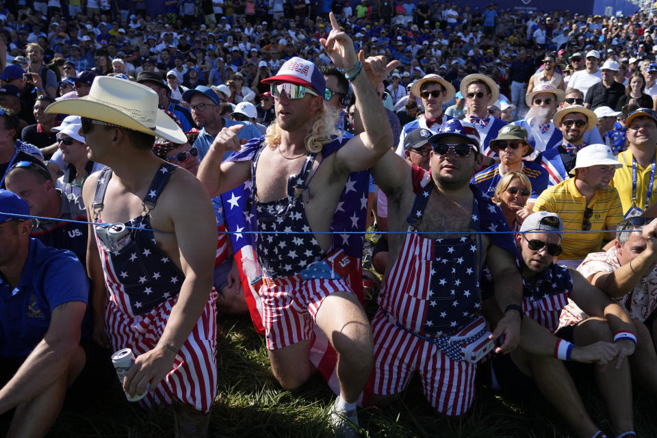 United States fans cheer on the 16th green as they watch the morning Foursome matches at the Ryder Cup golf tournament at the Marco Simone Golf Club in Guidonia Montecelio, Italy, Friday, Sept. 29, 2023. (AP Photo/Alessandra Tarantino)