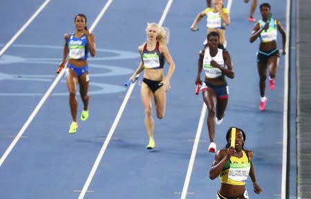 2016 Rio Olympics - Athletics - Preliminary - Women's 4 x 400m Relay Round 1 - Olympic Stadium - Rio de Janeiro, Brazil - 19/08/2016. Novlene Williams-Mills (JAM) of Jamaica leads the race. REUTERS/David Gray
