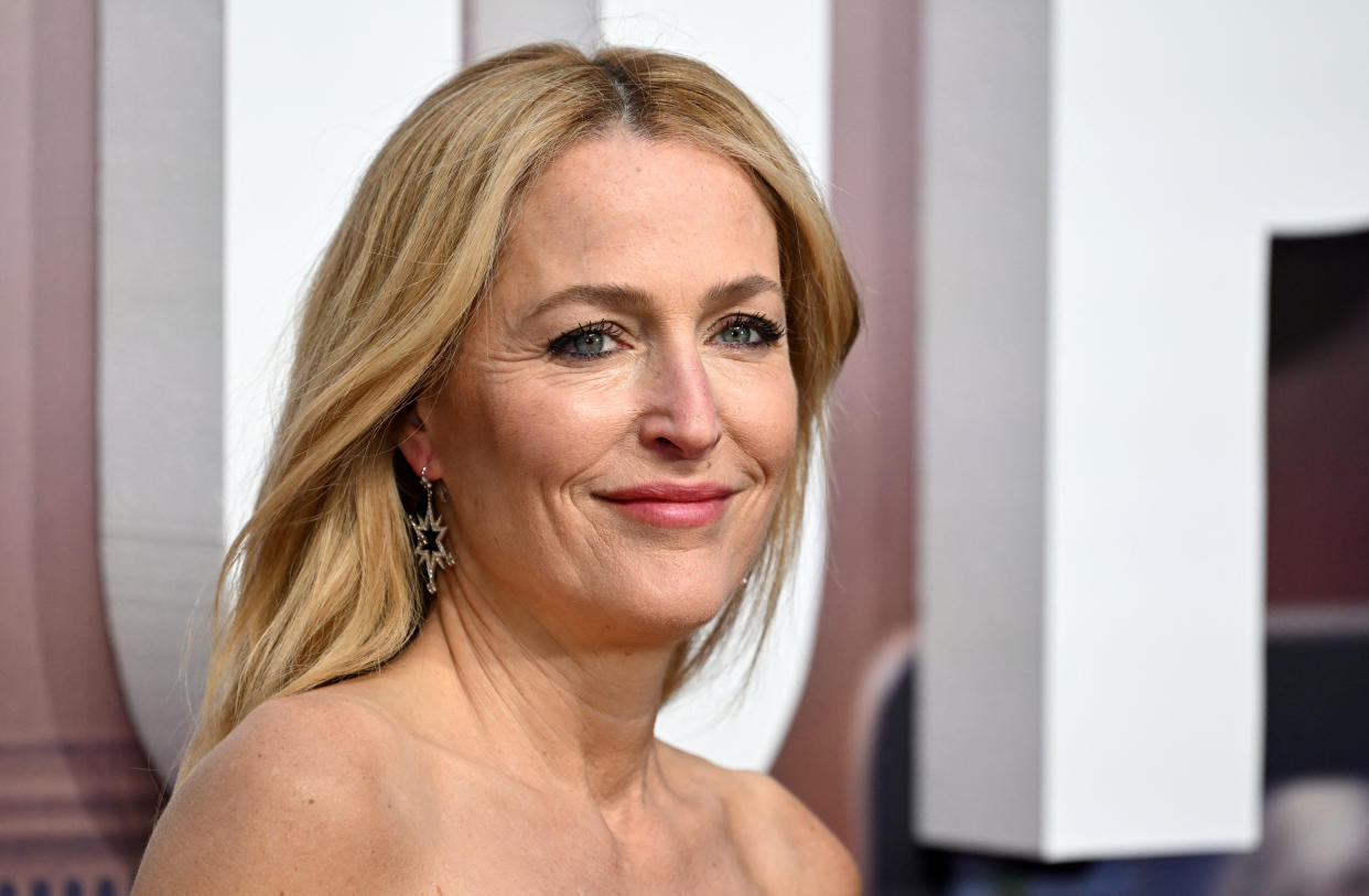 US actor Gillian Anderson poses on the red carpet upon arrival to attend the World Premiere of the film 