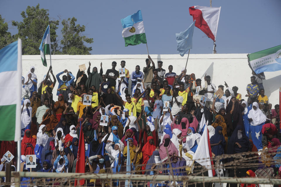 Residents and officials lead a demonstration supporting the government at Banadir stadium, Mogadishu, Thursday Jan. 12, 2023. The government rally encouraged an uprising against the al-Shabab group amid a month long military offensive. (AP Photo/Farah Abdi Warsameh)