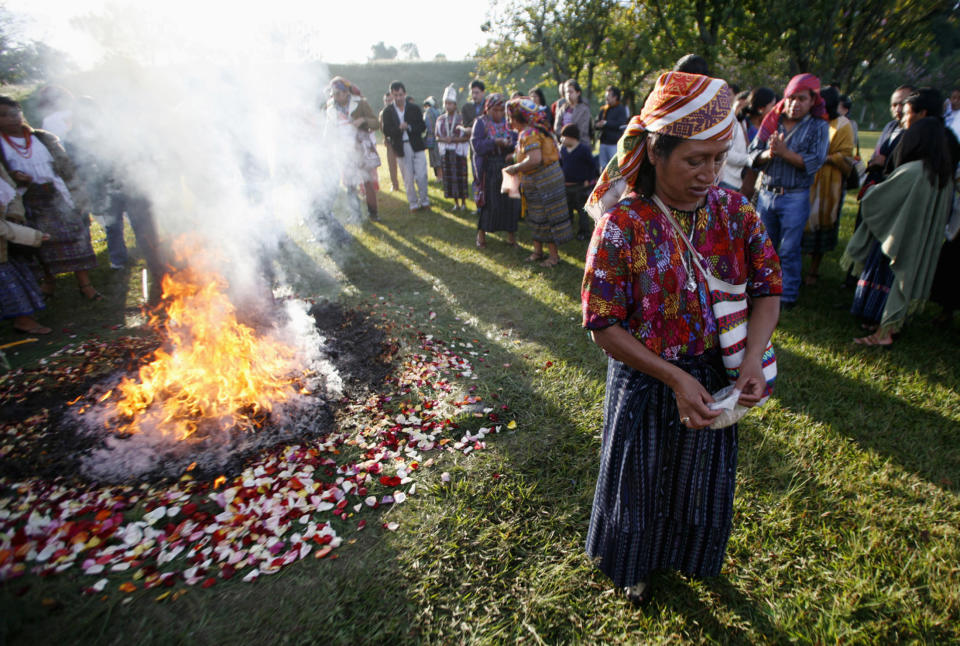 An indigenous woman takes part in a Mayan ceremony outside Guatemala City