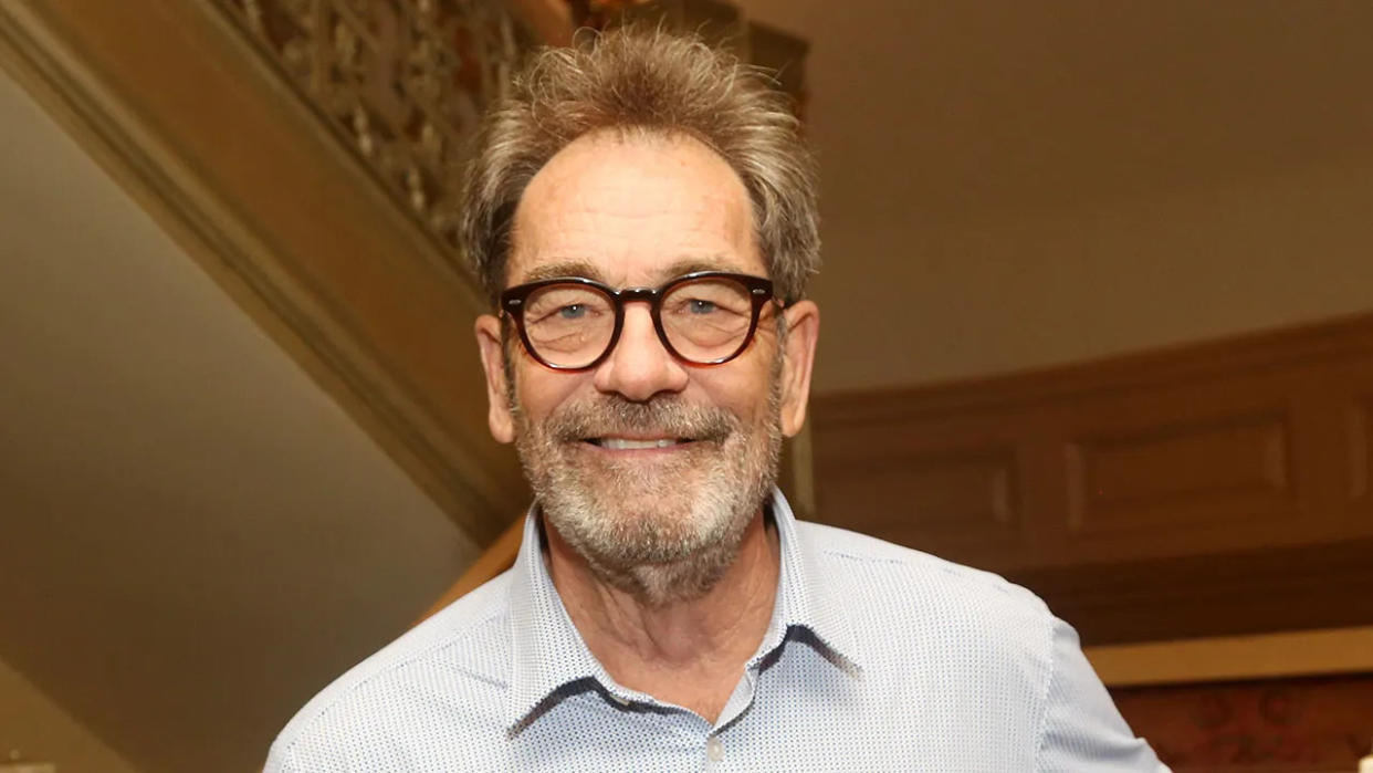 Close up of smiling Huey Lewis