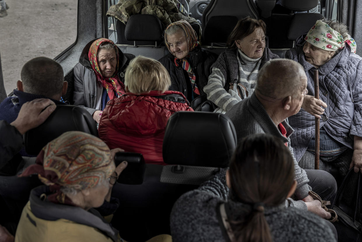 Residents from Vovchansk, Ukraine, and surrounding villages are transported from an evacuation point to Kharkiv, May 16, 2024. (Finbarr O