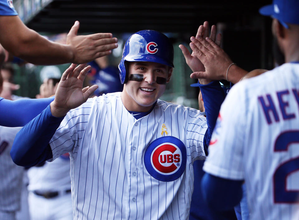 Chicago Cubs first baseman Anthony Rizzo (44) is congratulated in the dugout after scoring on a home run by Chicago Cubs right fielder Nicholas Castellanos (6) in the first inning against the Pittsburgh Pirates on Friday, Sept. 13, 2019 at Wrigley Field in Chicago, Ill. (Terrence Antonio James/Chicago Tribune/Tribune News Service via Getty Images)