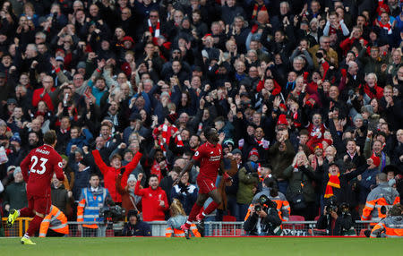 Soccer Football - Premier League - Liverpool v Cardiff City - Anfield, Liverpool, Britain - October 27, 2018 Liverpool's Sadio Mane celebrates scoring their fourth goal with Xherdan Shaqiri Action Images via Reuters/Lee Smith