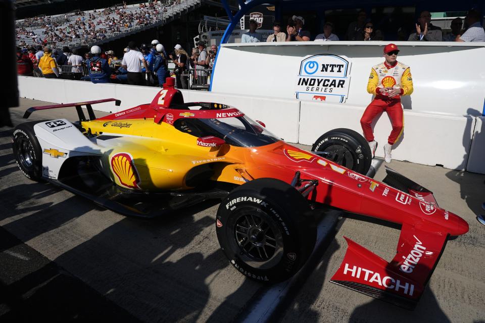 Josef Newgarden waits along pit wall during qualifications for the Indianapolis 500 auto race at Indianapolis Motor Speedway, Sunday, May 19, 2024, in Indianapolis. (AP Photo/Darron Cummings)