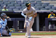 Oakland Athletics Matt Olson, right, watches his solo home run off New York Yankees starting pitcher Jordan Montgomery during the first inning of a baseball game against the New York Yankees, Sunday, June 20, 2021, at Yankee Stadium in New York. Yankees catcher Gary Sanchez, left, is behind the plate. (AP Photo/Kathy Willens)