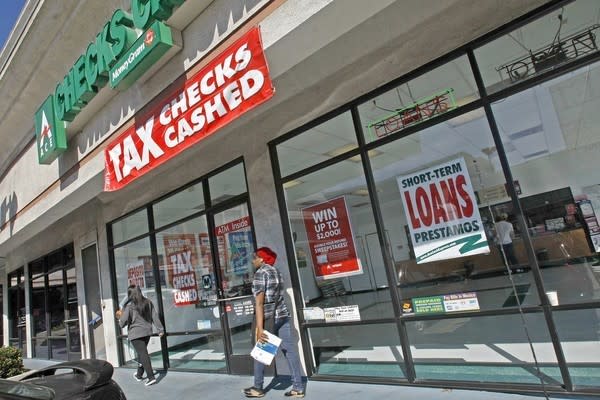 Ace Cash Express is a payday lender in a small shopping center in Van Nuys. California limits payday loans to $300 and a fee of 15%.