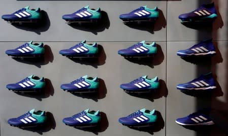 FILE PHOTO: Adidas soccer shoes are displayed at soccer shop KAMO in Tokyo